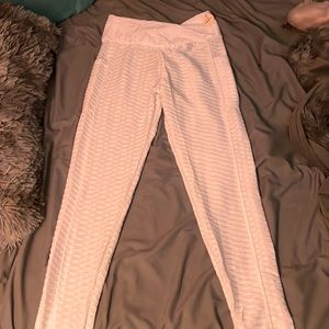 White slim fit pants to give plump butt